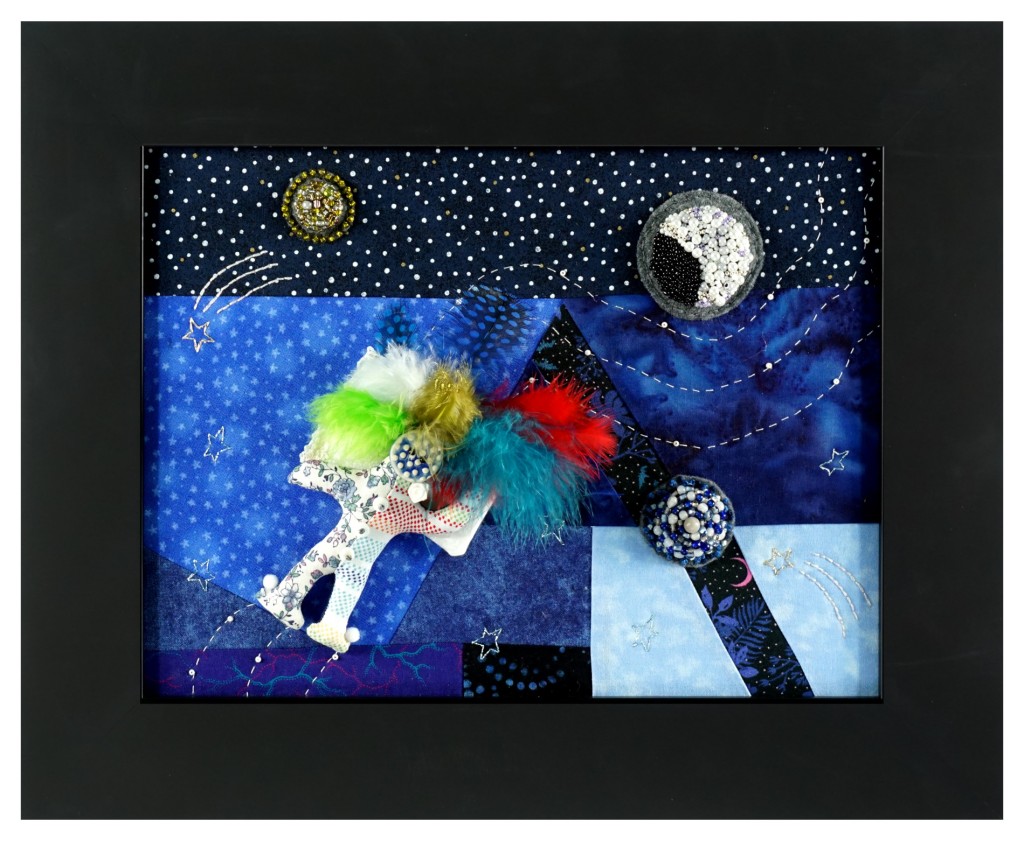 Space inspired dreamy textile art work with beaded planets.