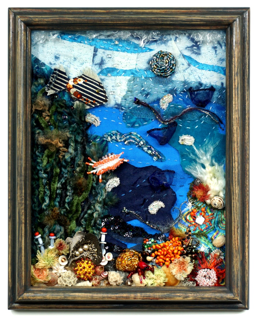 Beaded and embroidered ocean-inspired textile artwork